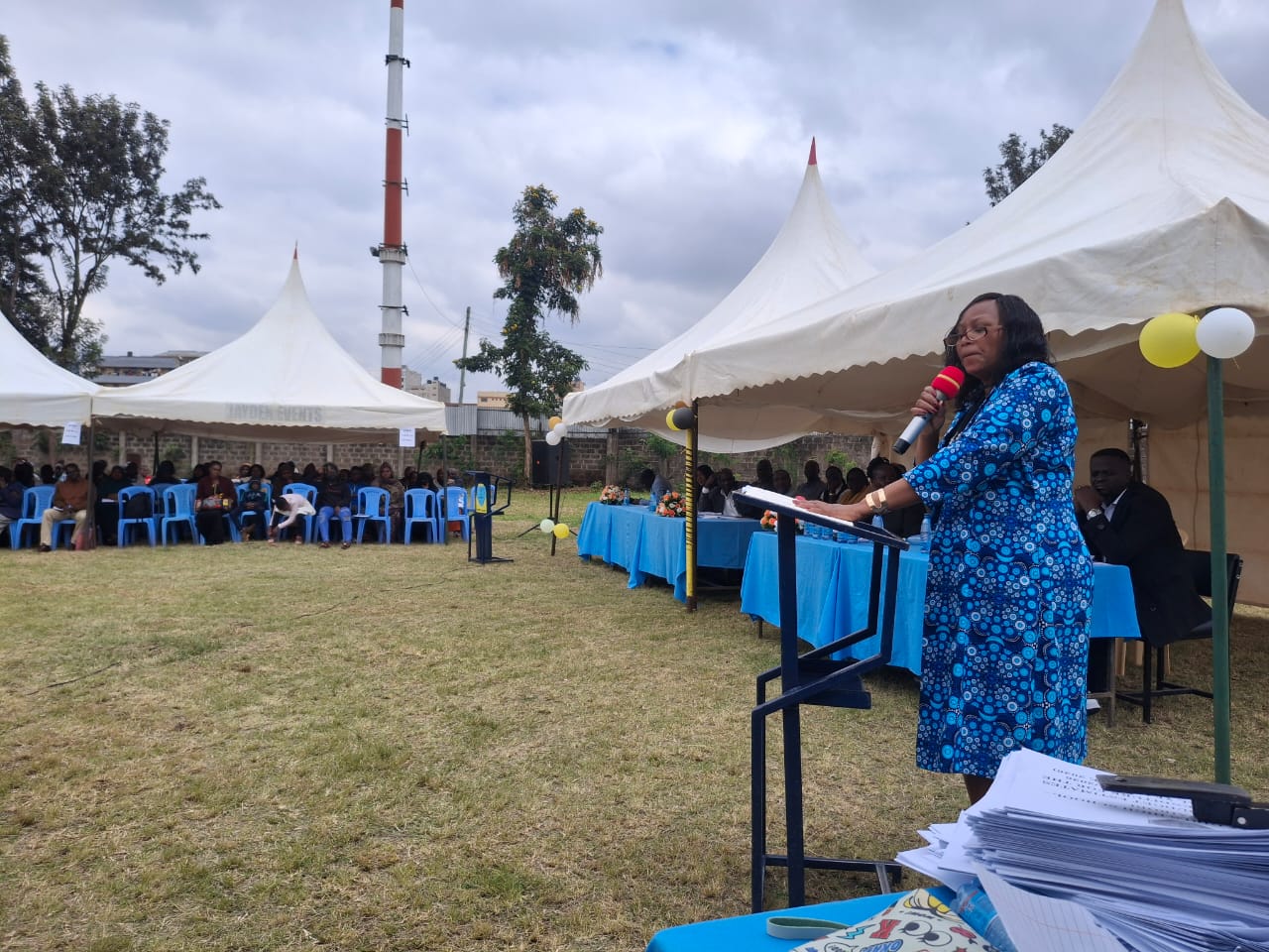 The School Principal Mrs Anne Kimani addressing the AGM meeting
